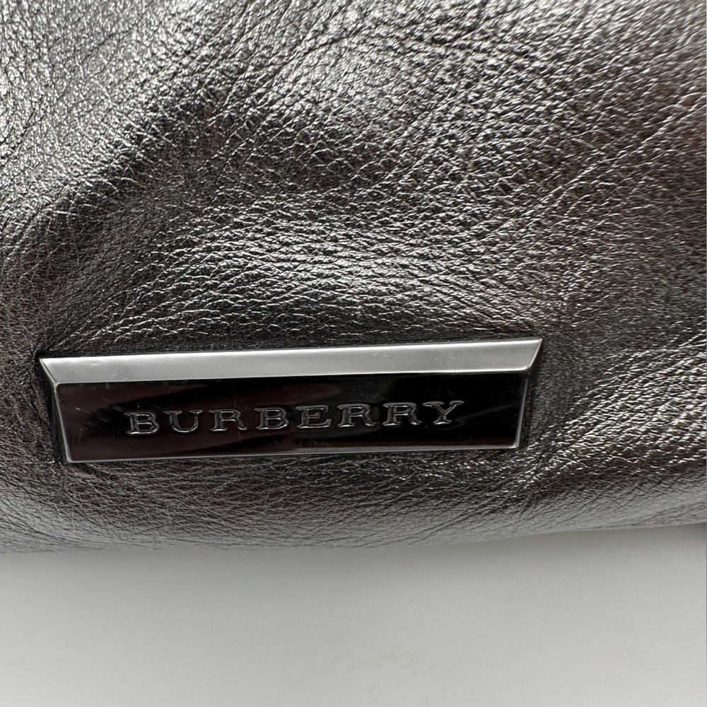 Burberry metallic and black hardware small duffel/Crossbody bag.
